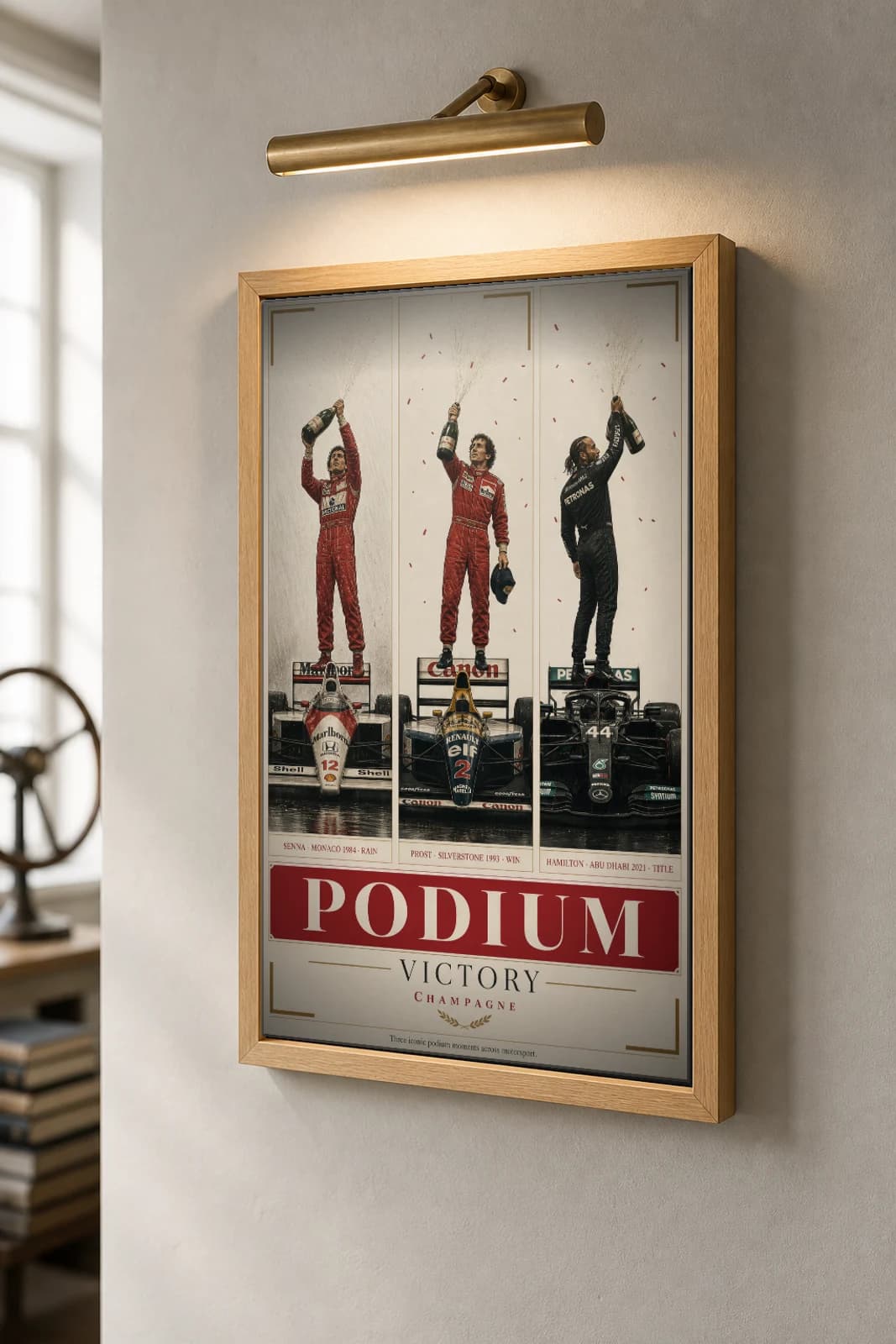 Podium — Senna · Prost · Hamilton Poster — McLaren (Brazil) · Williams-Renault (France) · Mercedes-AMG Petronas (United Kingdom) racing driver wall art · framed A2 — the framed print shown at a three-quarter angle on a styled gallery wall in a natural-oak frame