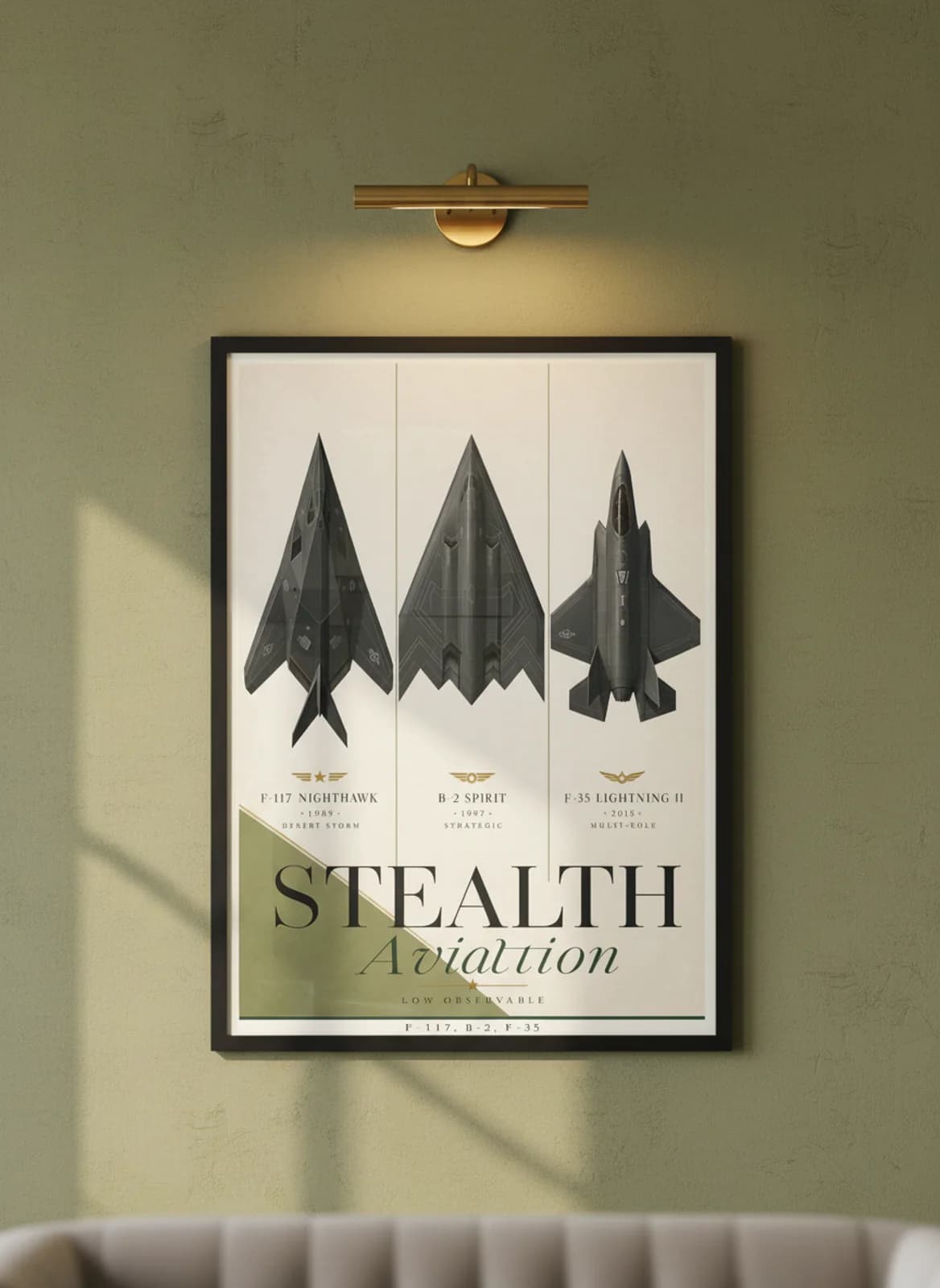 Stealth three-panel gallery set in black A2 frame on olive-green lime-wash wall — Gallery Sets mockup