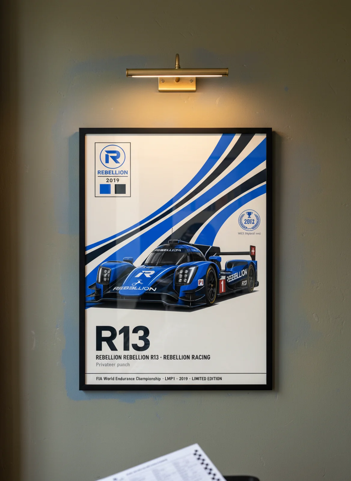 R13 — Rebellion Racing #1 WEC Masters endurance print in black A2 frame on saturated-blue olive wall — WEC Masters mockup