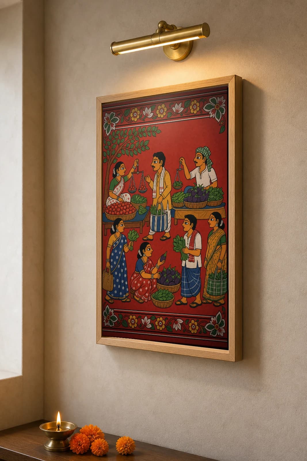 Rythu Bazaar Market Cheriyal Print — farmers weighing tomatoes and brinjals at the growers' market · collector edition on vermilion ground · Nakashi scroll grammar from Telangana — the framed print shown at a three-quarter angle on a styled gallery wall in a natural-oak frame