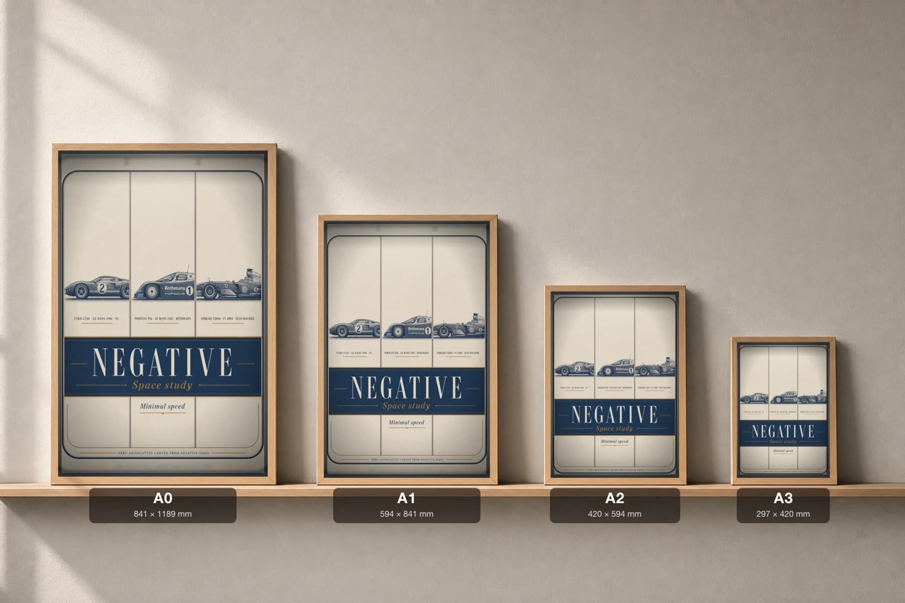 NEGATIVE Three-Panel Poster — gallery wall art set · framed A2 — print size guide showing the artwork at A0, A1, A2 and A3 in natural-oak frames at true relative scale